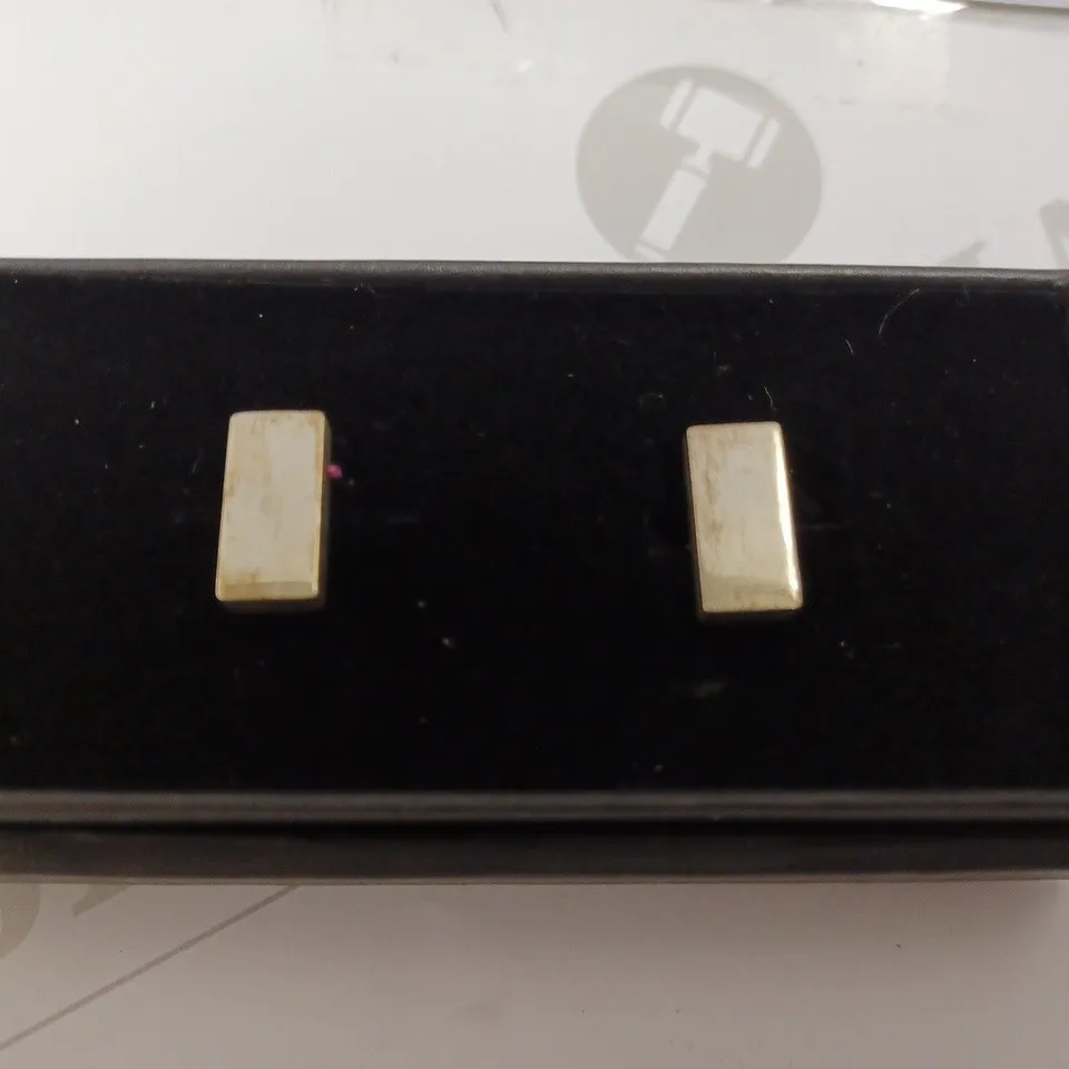 ALICE MADE THIS CUFF LINKS 