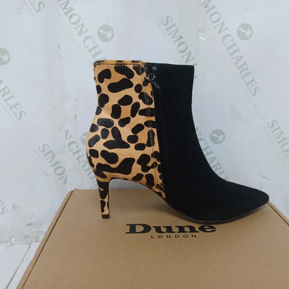 BOXED PAIR OF DUNE HEELED BOOTS IN LEOPARD SIZE 6