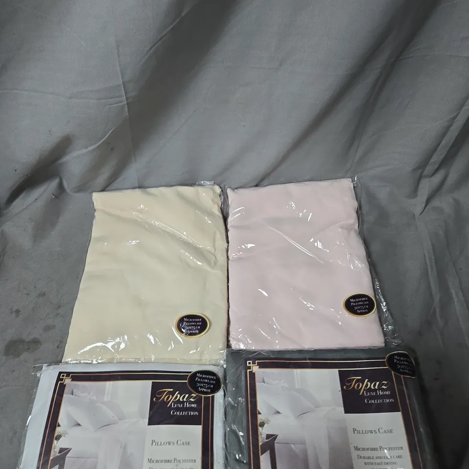 APPROXIMATELY 20 PILLOWCASES - VARIOUS COLOURS AND STYLES