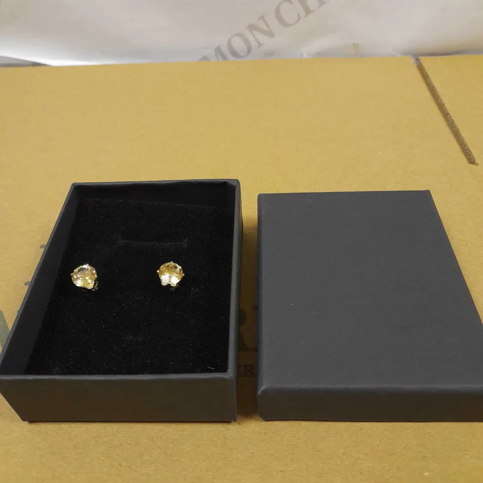 DESIGNER YELLOW STONE STUD EARRINGS 