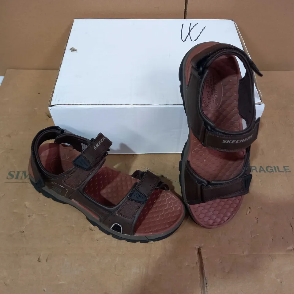 BOXED PAIR OF SKECHERS - SIZE 10