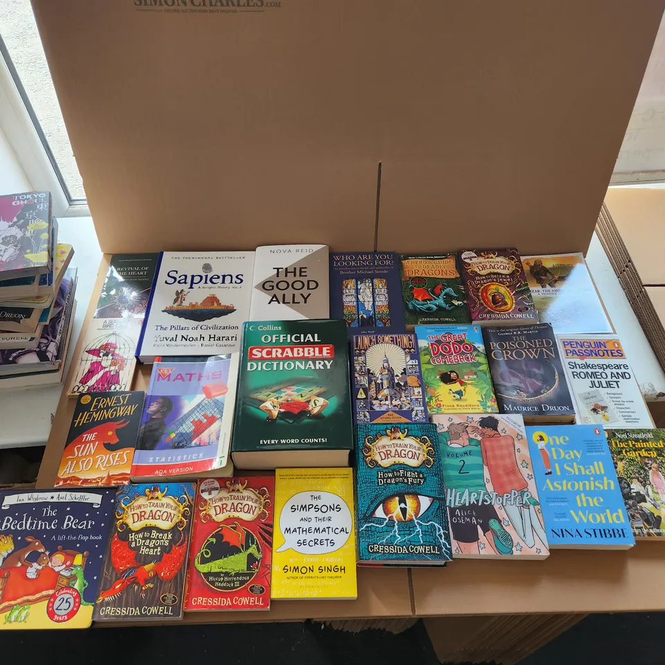 CAGE OF A SIGNIFICANT QUANTITY OF ASSORTED BOOKS BY TOM CLANCY, JOHN BOYNE, NIGELLA LAWSON, ISUI ISHIDA, CRESSIDA COWELL, WALTER M. MILLER JR, ETC