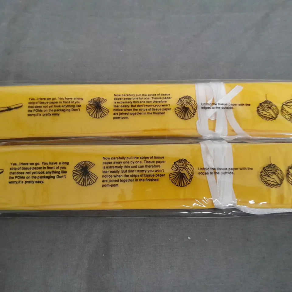 LARGE QUANTITY OF YELLOW 15" TISSUE PAPER DECORATIONS