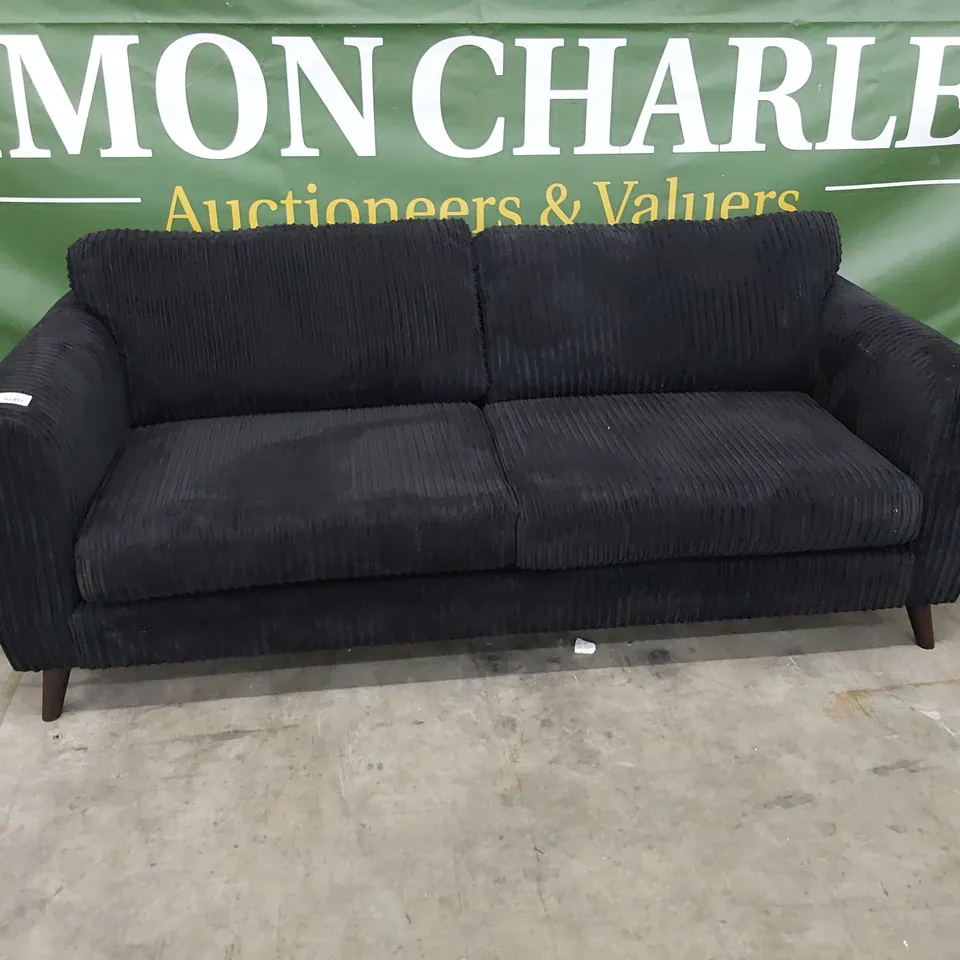 DESIGNER THREE SEATER SOFA BLACK JUMBO CHORD 