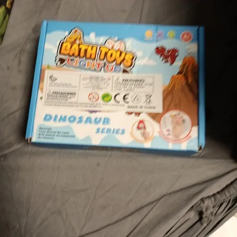 BOX OF APPROXIMATELY 10 ASSORTED TOYS INCLUDING BINGO GAME , GLOW T REX DINO DIG AND BATH TOYS LIGHT UP
