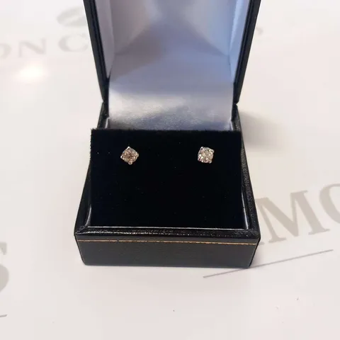 PLATINUM STUD EARRINGS SET WITH NATURAL DIAMONDS