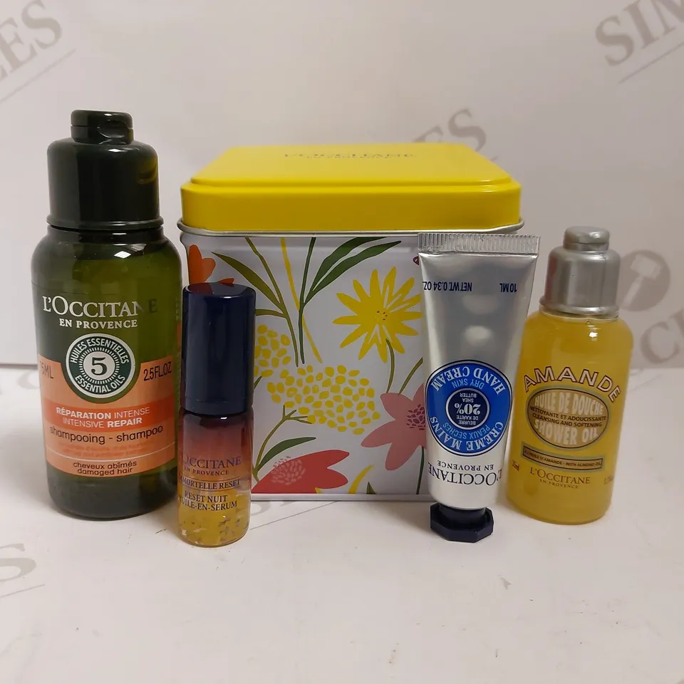 L`OCCITANE GIFT SET TO INCLUDE INTENSIVE REPAIR SHAMPOO, SHOWER OIL AND HAND CREAM