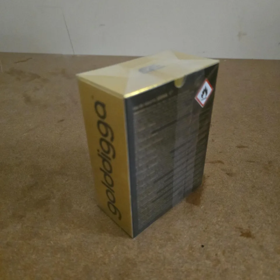 BOXED AND SEALED GOLDDIGGA DOLLAR POUR HOMME 100ML EAU DE TOILETTE
