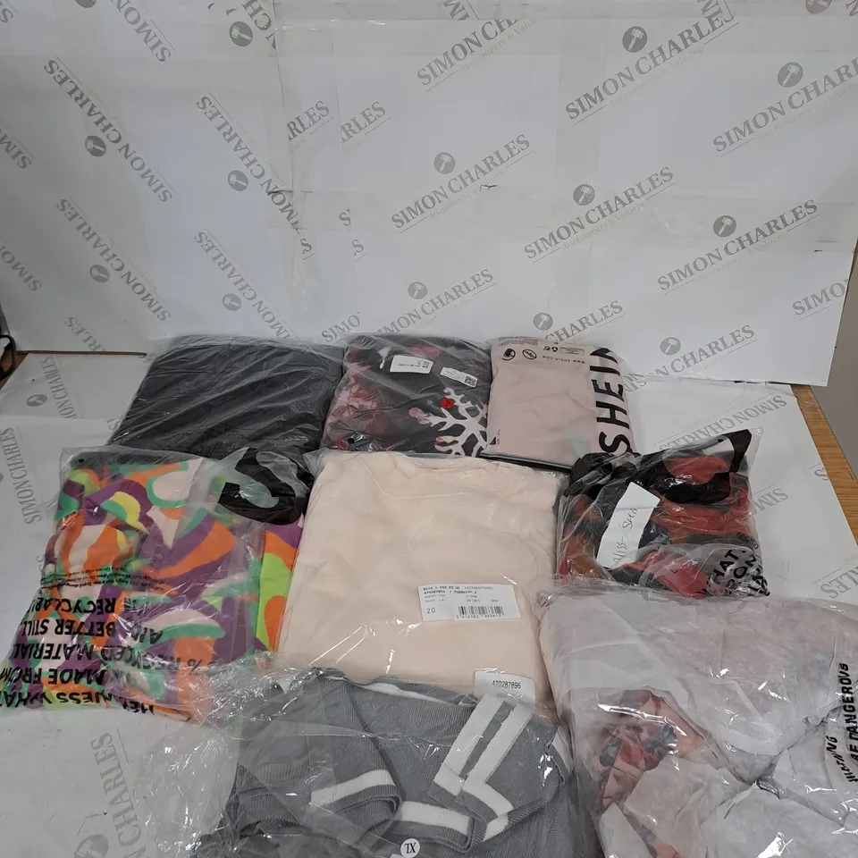 LARGE BOX OF ASSORTED CLOTHING ITEMS IN VARIOUS COLOURS AND SIZES INCLUDING TROUSERS , TOPS AND JUMPERS 