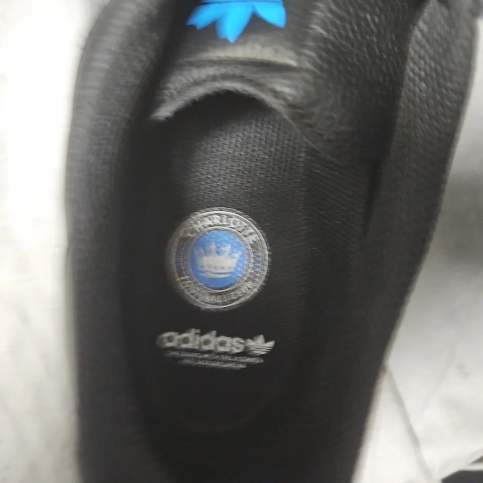 BOXED ADIDAS BLACK SHEEP SNEAKERS – UK 9 (US 9.5), BLACK WITH LIGHT BLUE STRIPES