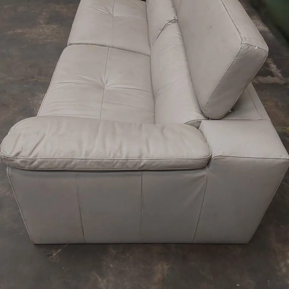 DESIGNER 4 SEATER LEATHER UPHOLSTERED SOFA WITH ADJUSTABLE HEADREST