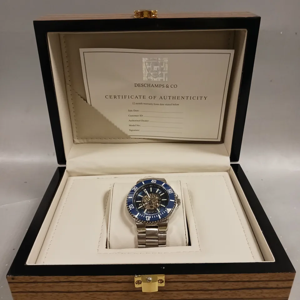 MENS DESCHAMPS & CO AUTOMATIC WATCH – SKELETON DIAL – CERAMIC BEZEL - STAINLESS STEEL STRAP