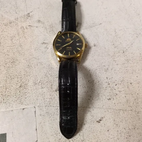 ORIENT CRYSTAL 21 JEWELS GOLD TONE WATCH WITH BLACK DIAL