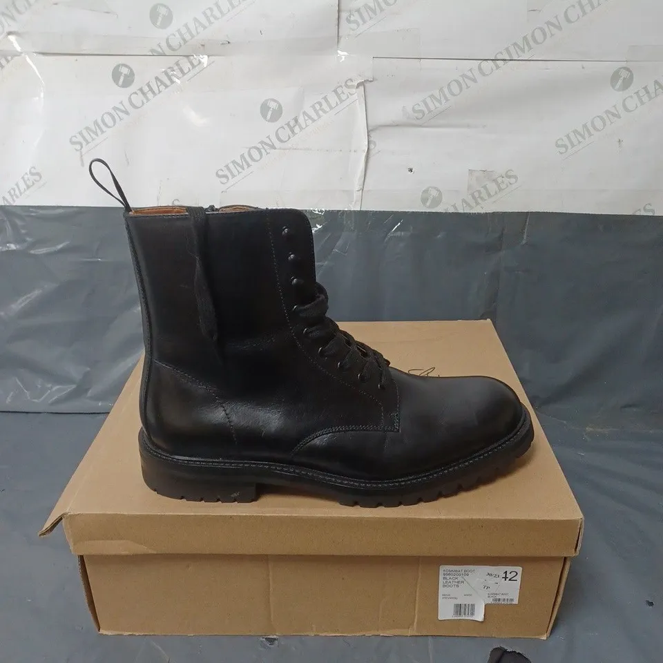 BOXED PAIR OF STEVE MADDEN BLACK LEATHER KOMMBAT BOOTS SIZE UNSPECIFIED