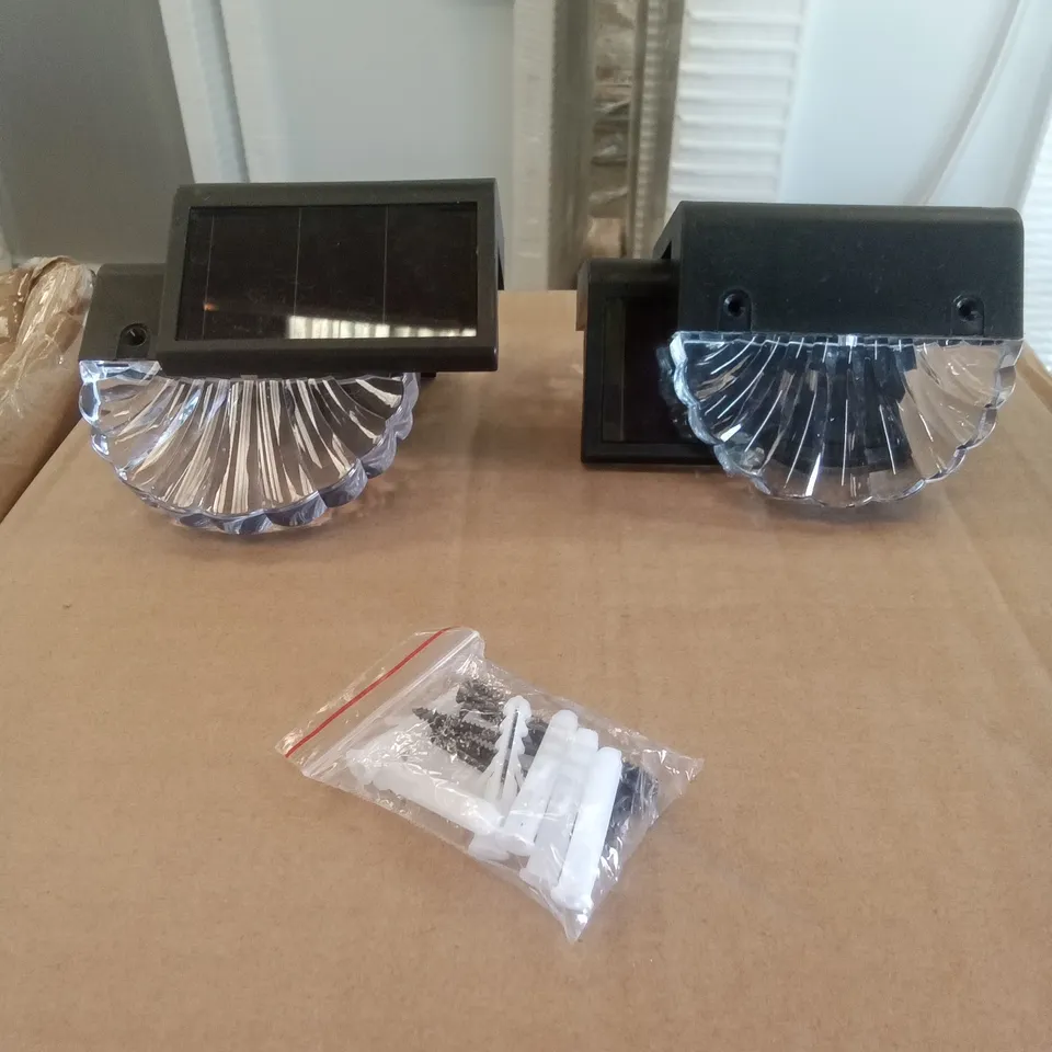 TWO SETS OF 4 LED SOLAR RAILING LIGHTS