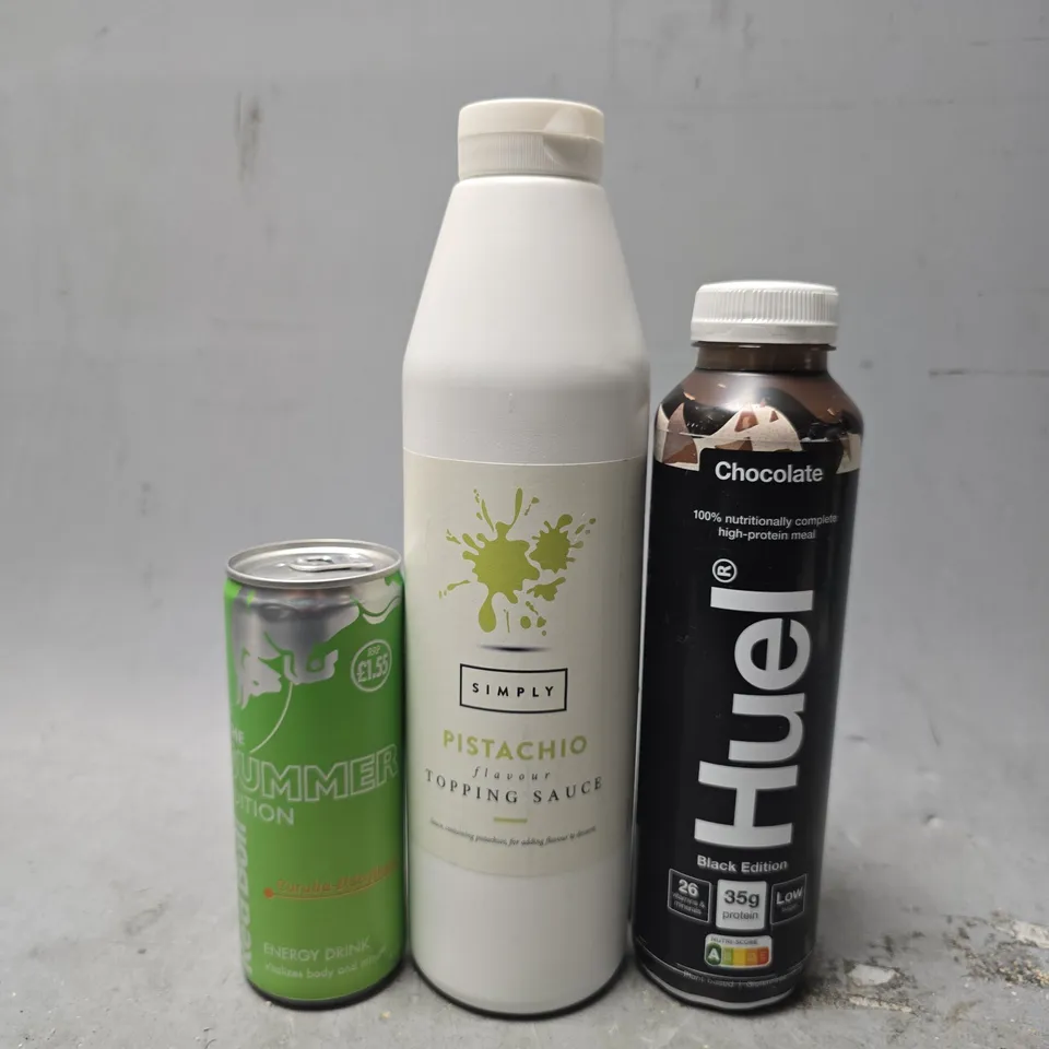 APPROXIMATELY 12 ASSORTED DRINKS ITEMS TO INCLUDE - RED BULL , HUEL CHOCOLATE , SIMPLY PISTACHIO 