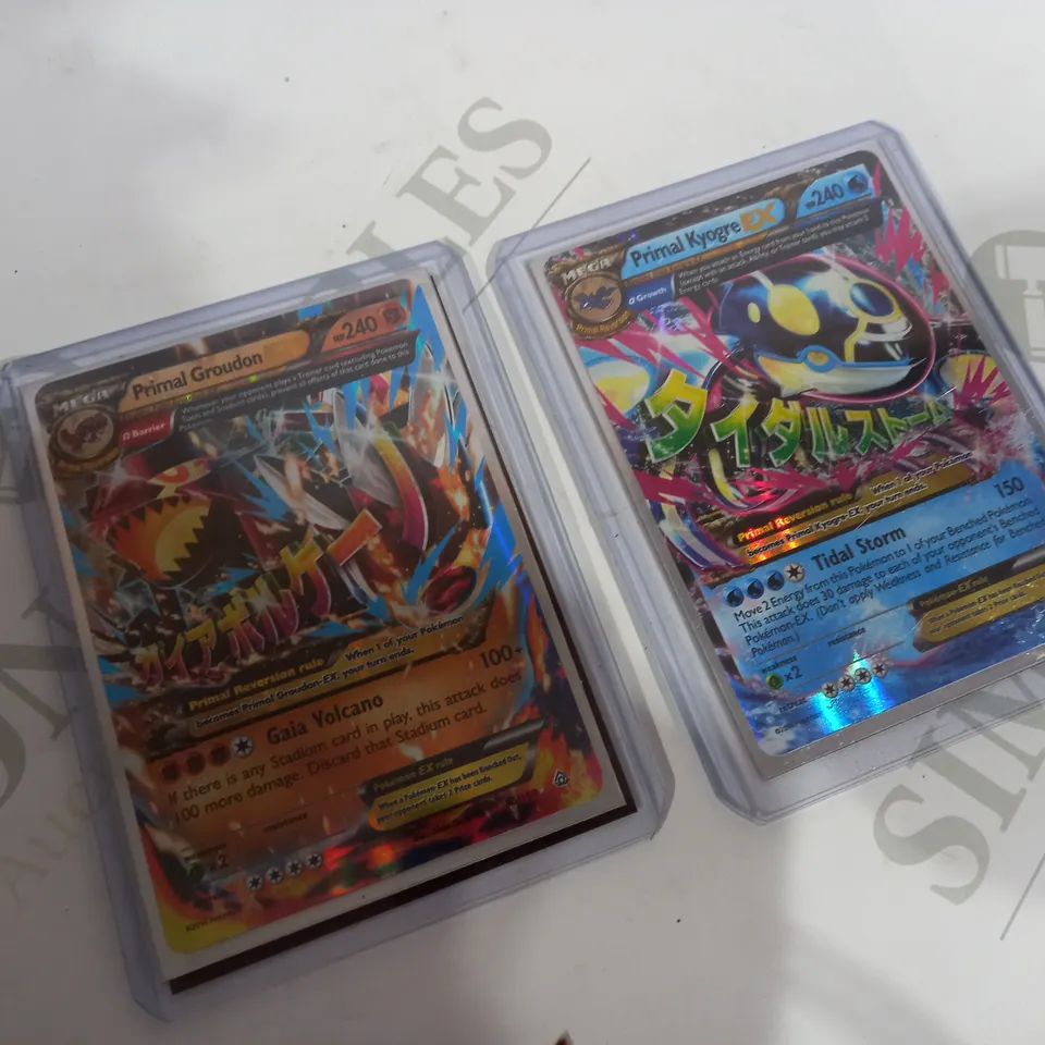 TWO POKEMON CARDS: PRIMAL GROUDON AND PRIMAL KYOGRE