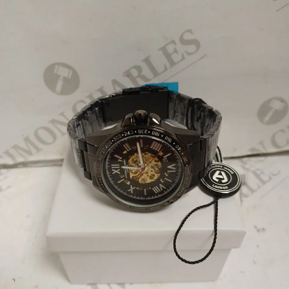 BOXED ANTHONY JAMES WATCH - AUTOMATIC - WATER RESISTANT 3ATM - SKELETON FACE - STAINLESS STEEL BLACK. 