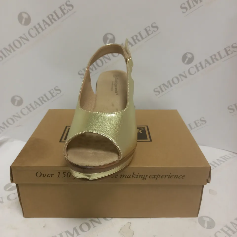 BOXED PAIR OF CUSHION WALK WEDGE SHOES IN GOLD - SIZE 6