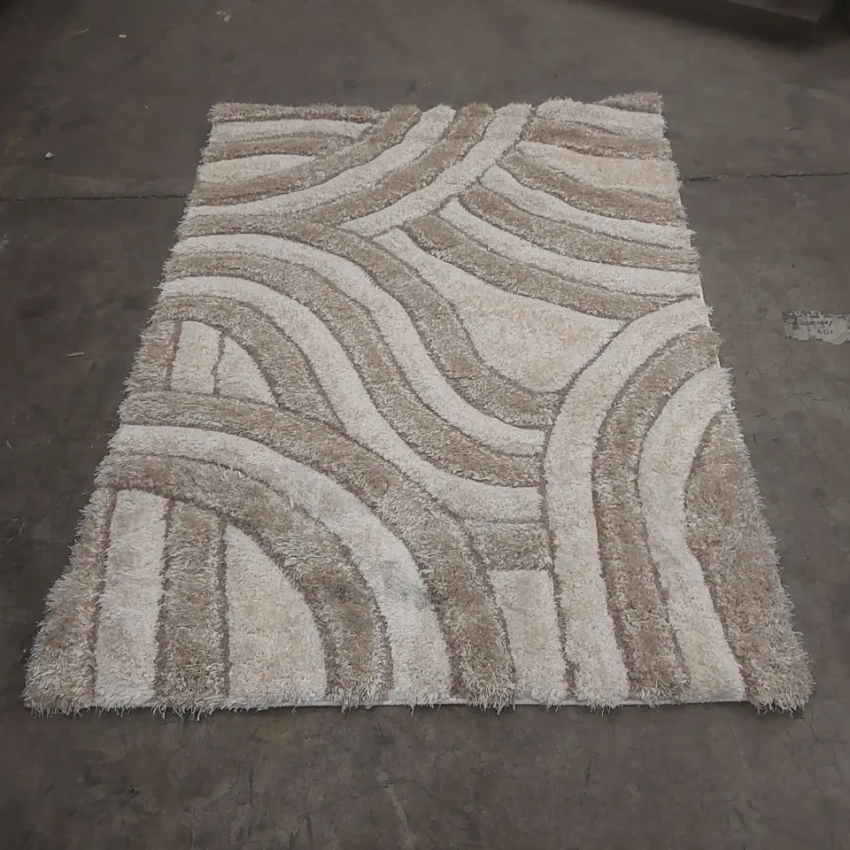 BEIGE WAVE-PATTERN AREA RUG - 170 x 120cm