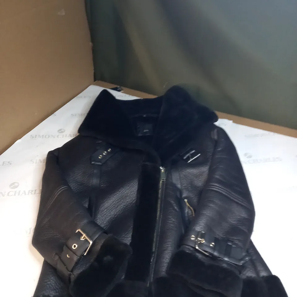 WOMENS FAUX LEATHER AND FAUX FUR JACKET SIZE UNSPECIFIED