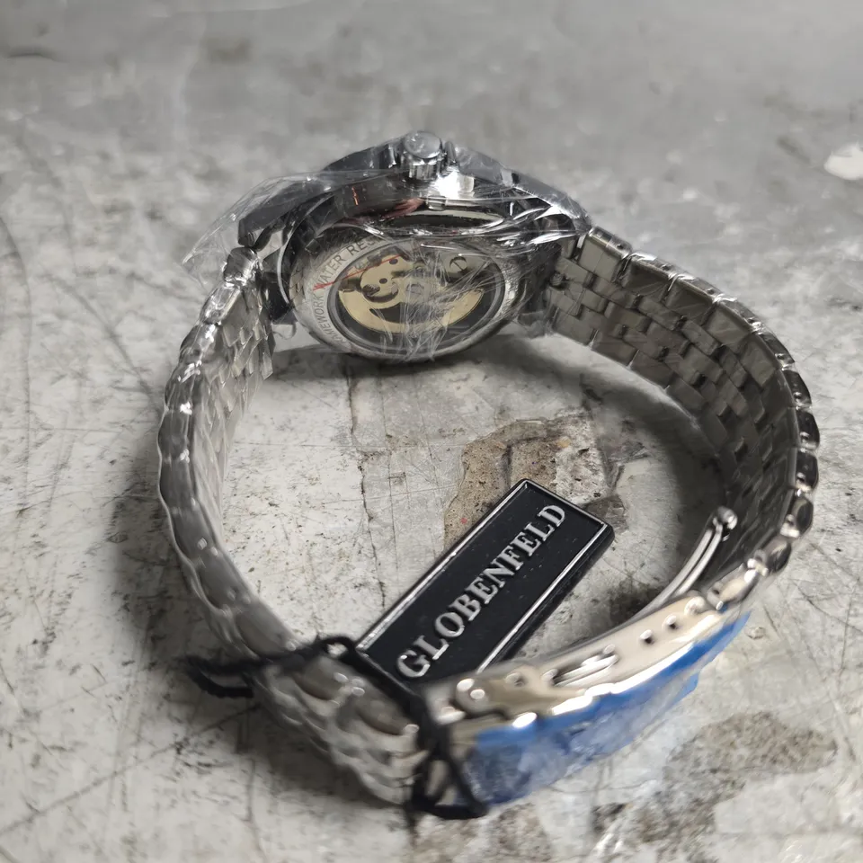 BOXED GLOBENFIELD EXHIBITION DIAL GENTS WATCH WITH SKELETON BACK CASE AND METAL STRAP