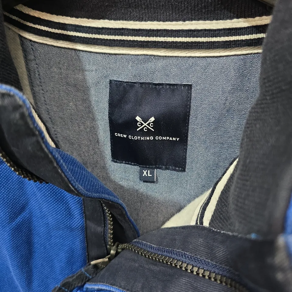 CREW CLOTHING COMPANY BLUE RUGBY-STYLE TOP, XL, CREST PATCH WITH 'CREW 93 ANNO DOMINI'
