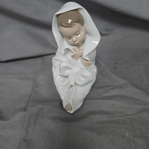 NAO PORCELAIN BABY FIGURINE IN WHITE HOODED ROBE
