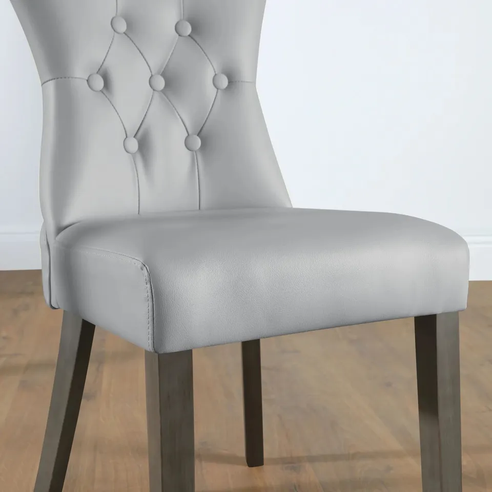 BOXED BEWLEY LIGHT GREY LEATHER BUTTON BACK DINING CHAIR (GREY LEG)