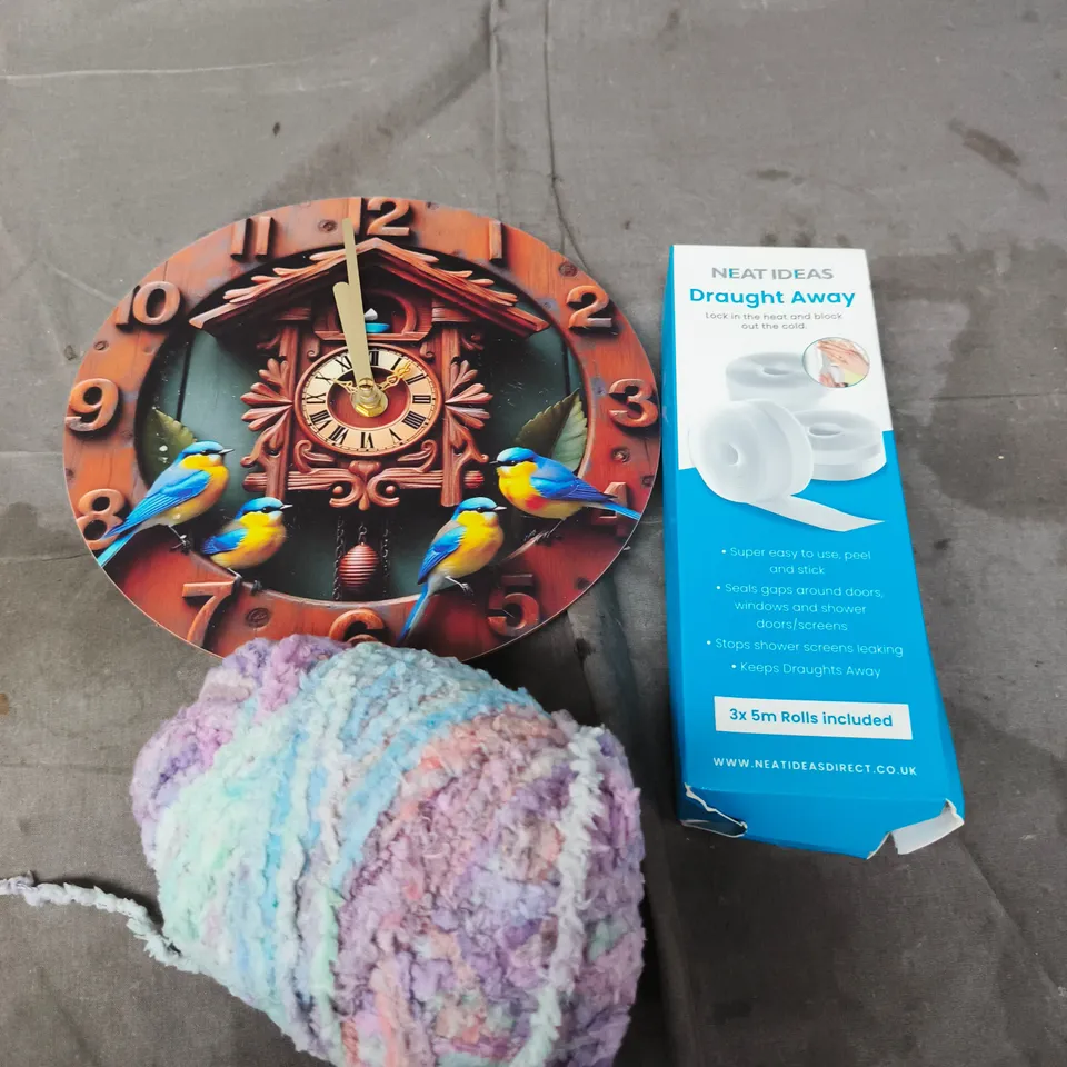 APPROXIMATELY 20 ASSORTED HOUSEHOLD PRODUCTS TO INCLUDE WALL CLOCK, DRAUGHT AWAY, YARN ETC 