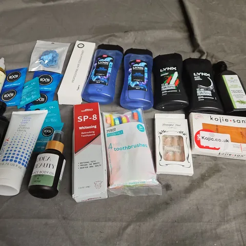 APPROXIMATELY 12 ASSORTED HEALTH & BEAUTY PRODUCTS TO INCLUDE CONDOMS, LYNX BODYWASH, AND WHITENING TOOTHPASTE ETC.