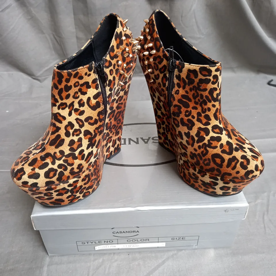 BOX OF 8 PAIRS OF CASSANDRA WEDGE ANKLE BOOTS IN LEOPARD WITH GOLD SPIKES - VARIOUS SIZES