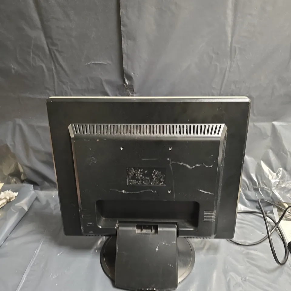 GNR COMPUTER MONITOR – BLACK BEZEL WITH SILVER TRIM ON CIRCULAR STAND .