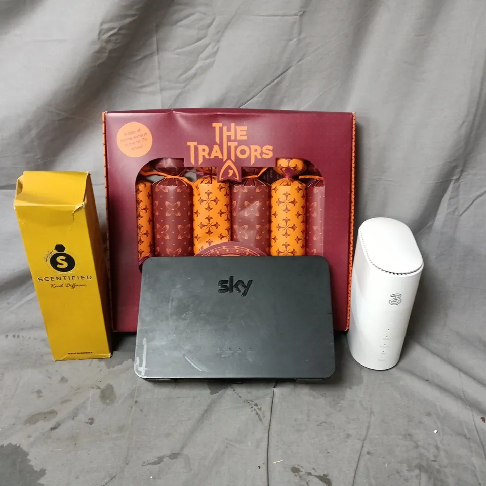 BOX OF APPROXIMATELY 40 ASSORTED HOUSEHOLD ITEMS INCLUDING THE TRAITORS CHRISTMAS CRACKERS, REED DIFFUSER, THREE WIFI HUB AND SKY HUB