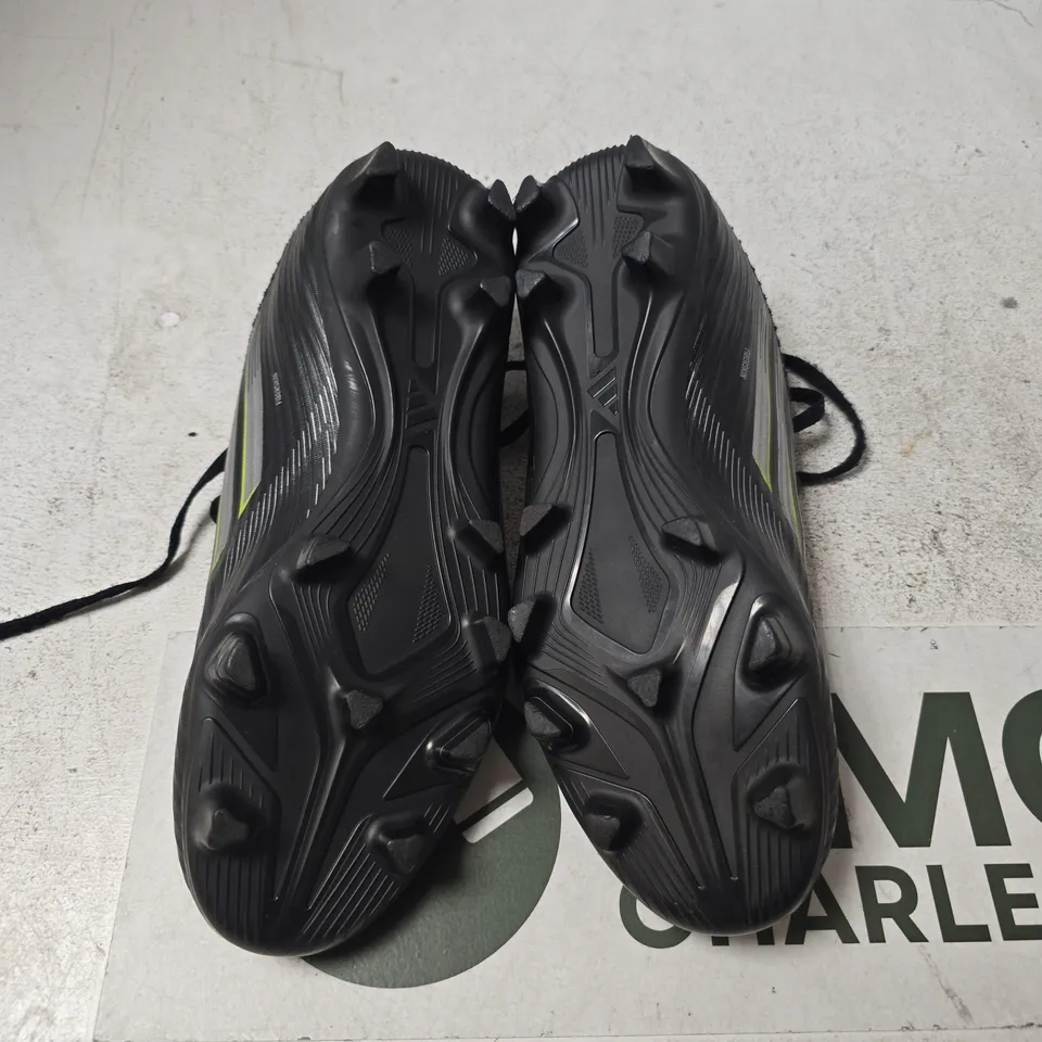 Football boots – black with neon detailing