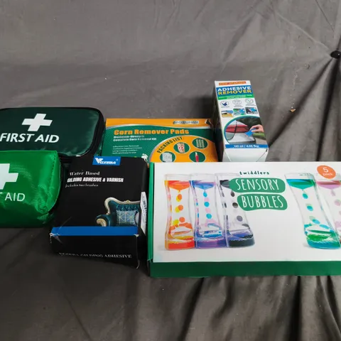 APPROX 10 ASSORTED ITEMS TO INCLUDE FIRST AID KIT , ADHESIVE REMOVER AND SENSORY BUBBLES