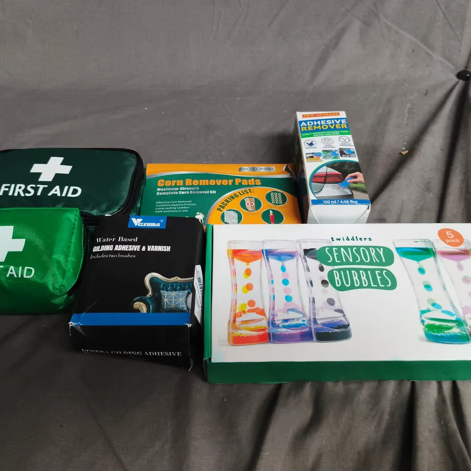 APPROX 10 ASSORTED ITEMS TO INCLUDE FIRST AID KIT , ADHESIVE REMOVER AND SENSORY BUBBLES