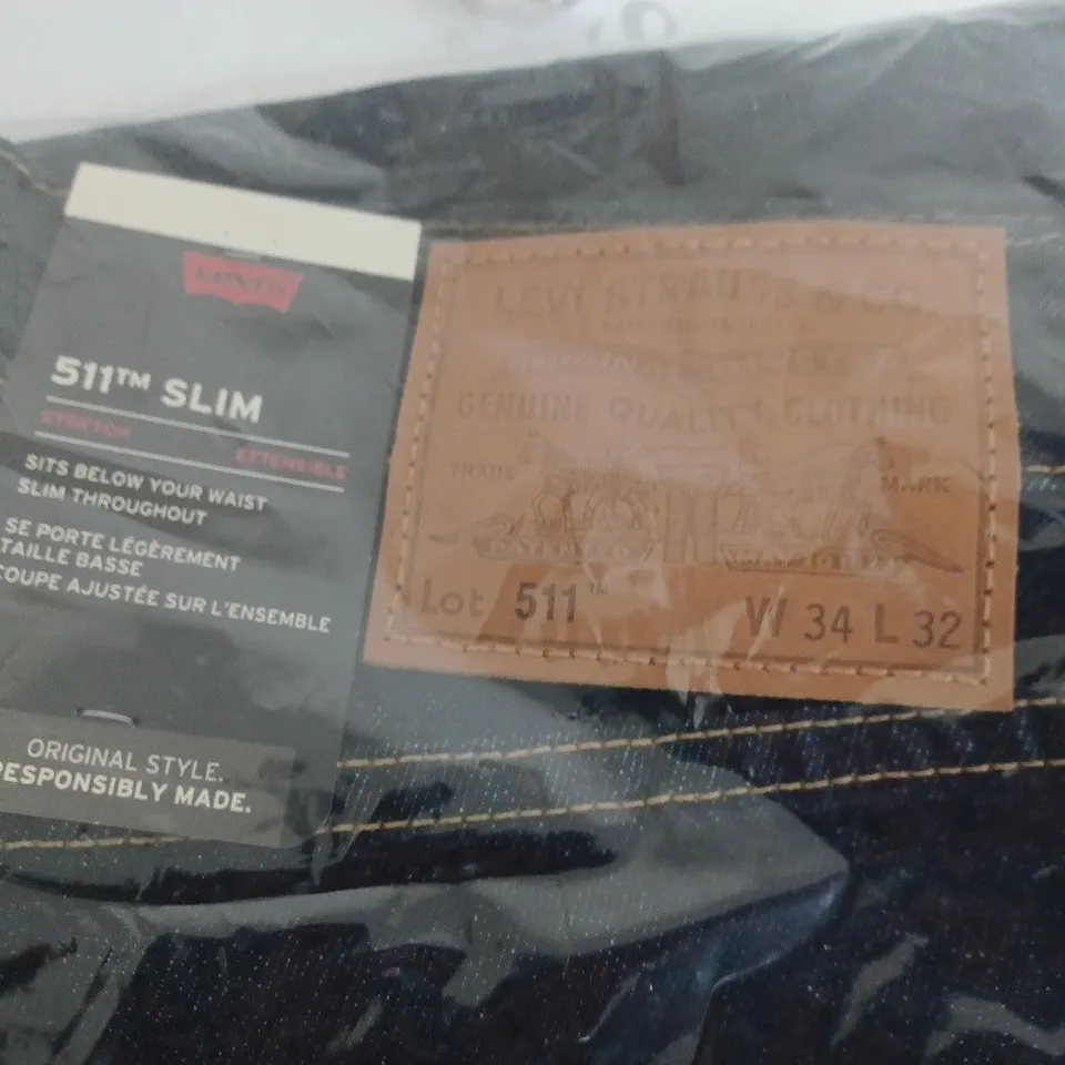 BAGGED LEVIS 511 SLIM DARK BLUE JEANS - W34 L32