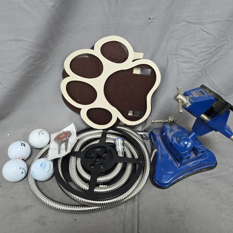 APPROXIMATELY 12 ASSORTED HOUSEHOLD ITEMS TO INCLUDE DRAPER CLAMP, GOLFBALLS, ULTRA SLIM VIBRATION ALARM, ETC