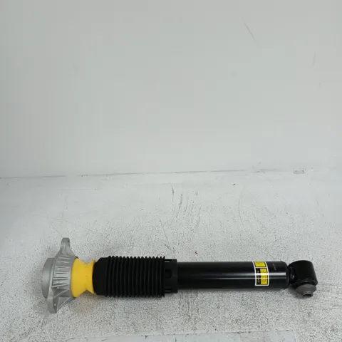 AUTOMOTIVE SHOCK ABSORBER WITH MOUNTING FLANGE