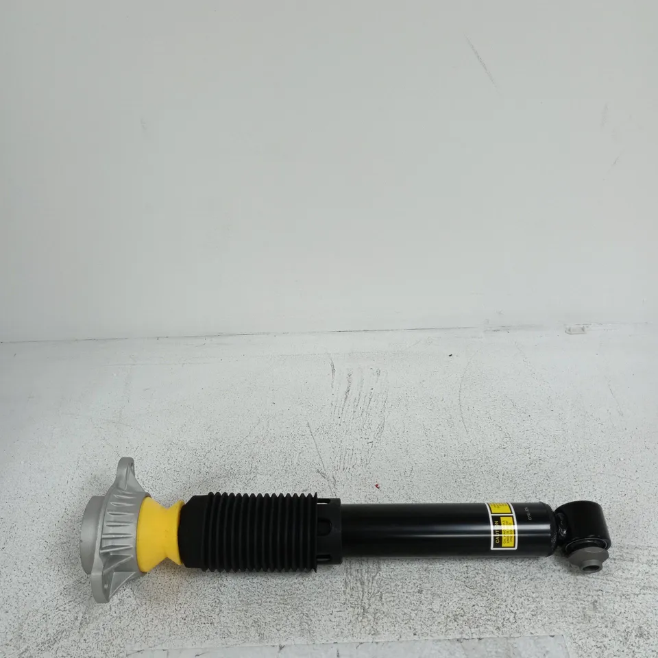 AUTOMOTIVE SHOCK ABSORBER WITH MOUNTING FLANGE