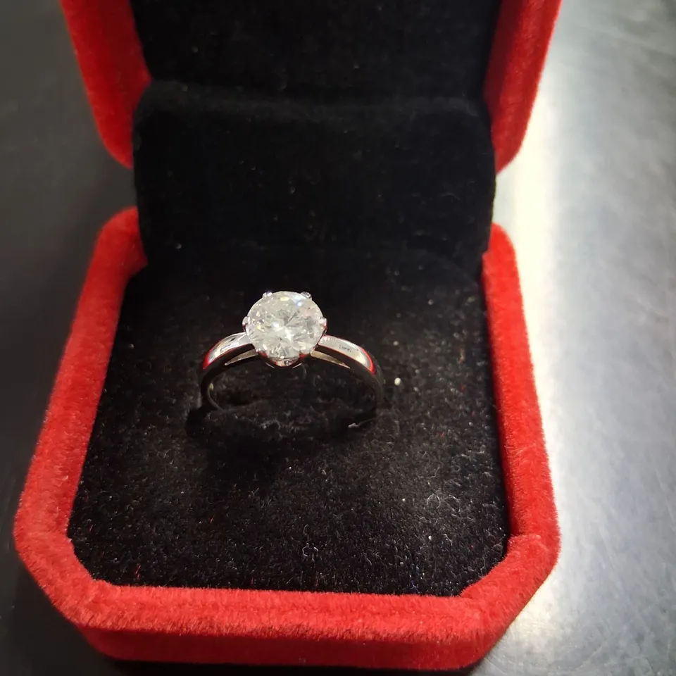 18CT WHITE GOLD SOLITAIRE RING SET WITH A NATURAL DIAMOND WEIGHING +1.23CT