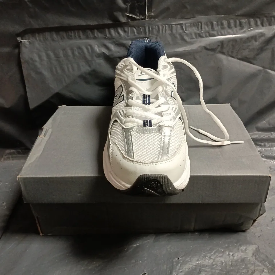 BOXED PAIR OF NEW BALANCE 530 TRAINERS IN WHITE/SILVER/NAVY SIZE UK 10