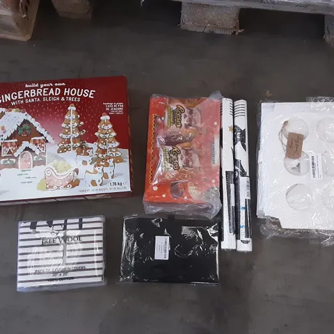 PALLET OF ASSORTED HOMEWARE ITEMS TO INCLUDE GINGERBREAD HOUSE, PARTY DECOR, CUSHION COVERS ETC