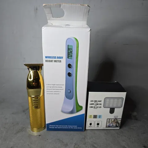 APPROXIMATELY 5 ASSORTED ITEMS TO INCLUDE - HEIGHT METER , LED CUBE LIGHT , HAIR TRIMMER ETC