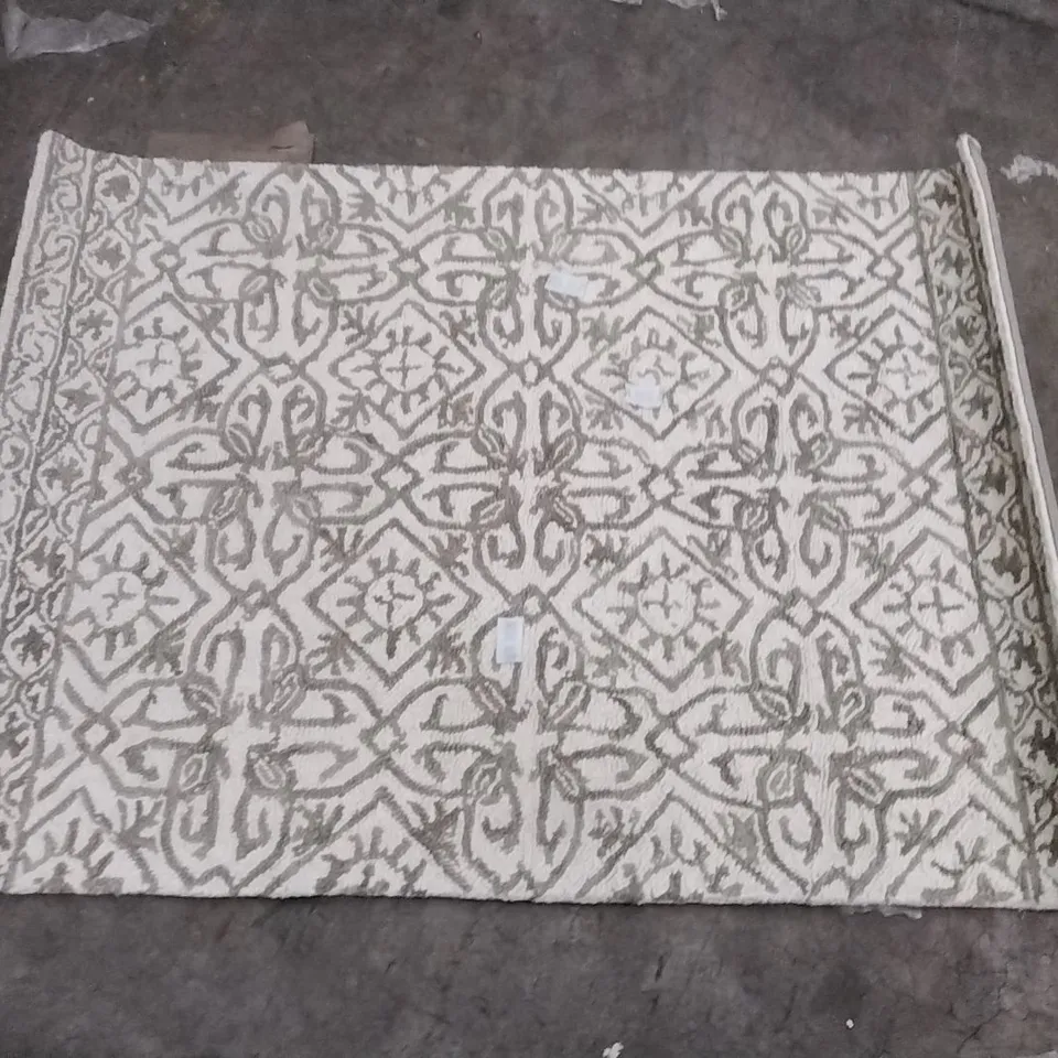STILLAGE OF APPROXIMATELY 20 DESIGNER RUGS
