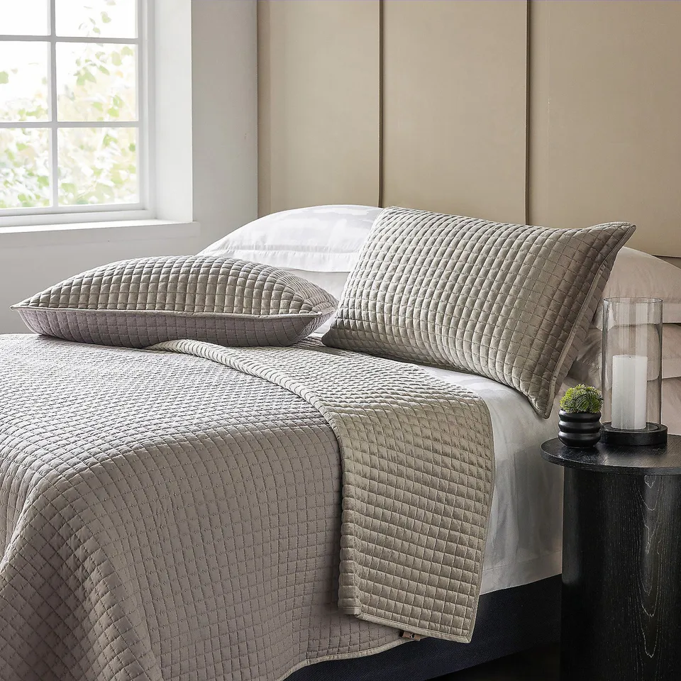 GREY QUILTED BEDSPREAD WITH MATCHING CUSHIONS -K by Kelly Hoppen Quilted Bedspread and Set of 2 Decorative Pillowcases .