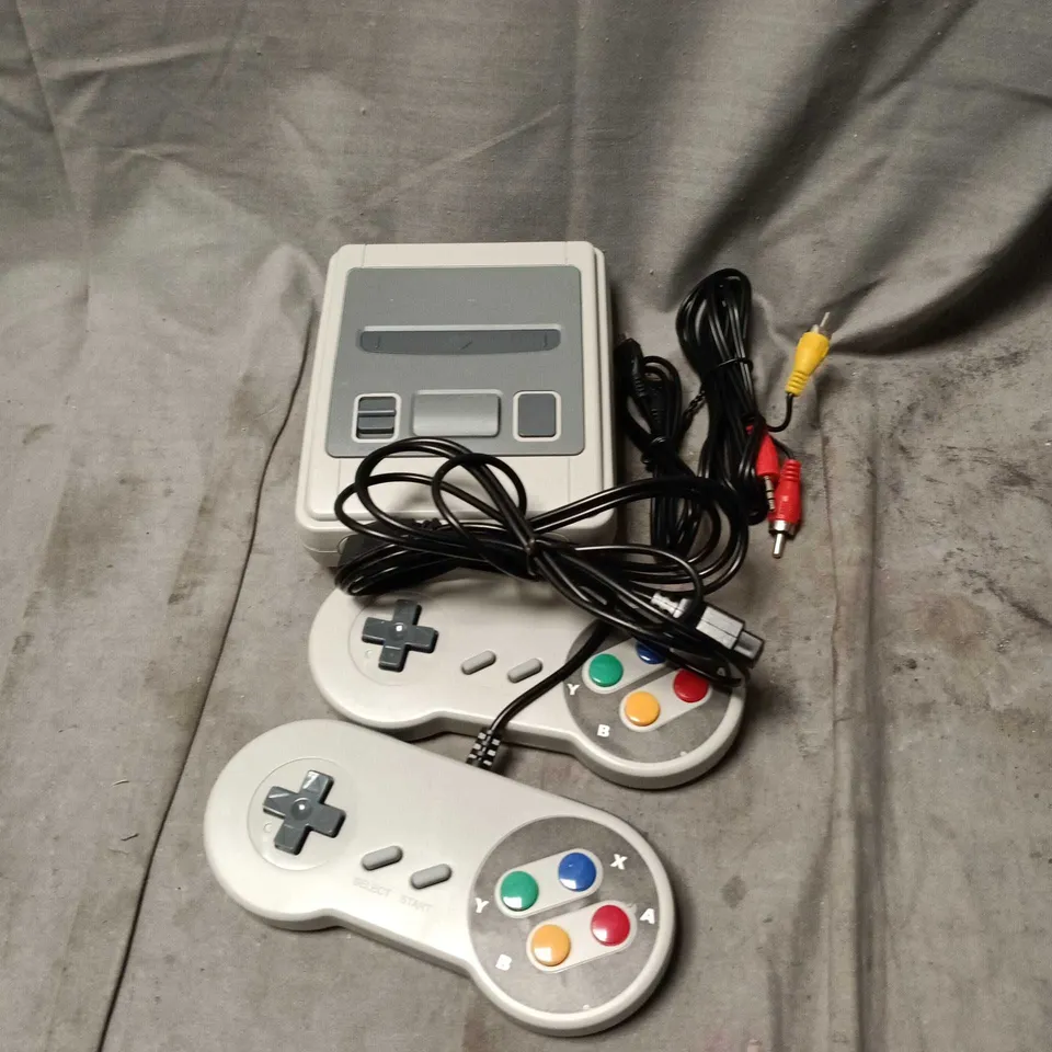 CLASSIC MINI TV GAME SYSTEM WITH 2 WIRED CONTROLLERS – 620 BUILT-IN GAMES (BOXED)