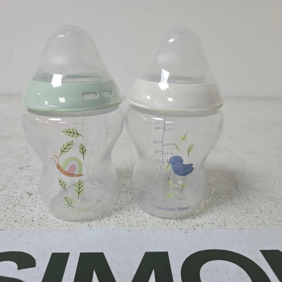 SET OF 2 TOMMEE TIPPEE BABY BOTTLES WITH AN ANIMAL DESIGN