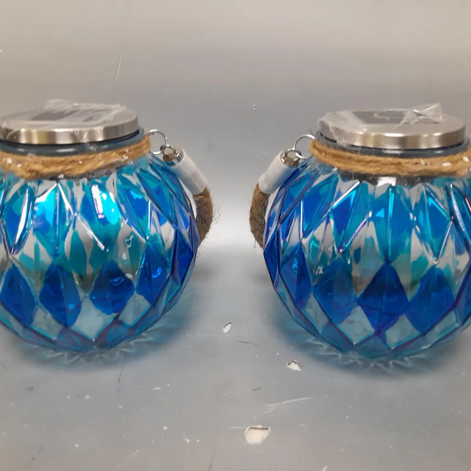 BOXED BELL AND HOWELL SET OF 2 SOLAR JAR LIGHTS